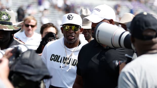 Colorado Buffaloes head coach Deon Sanders walks off the field aft winning the game against the TCU Horned Frogs at Amon G. Carter Stadium